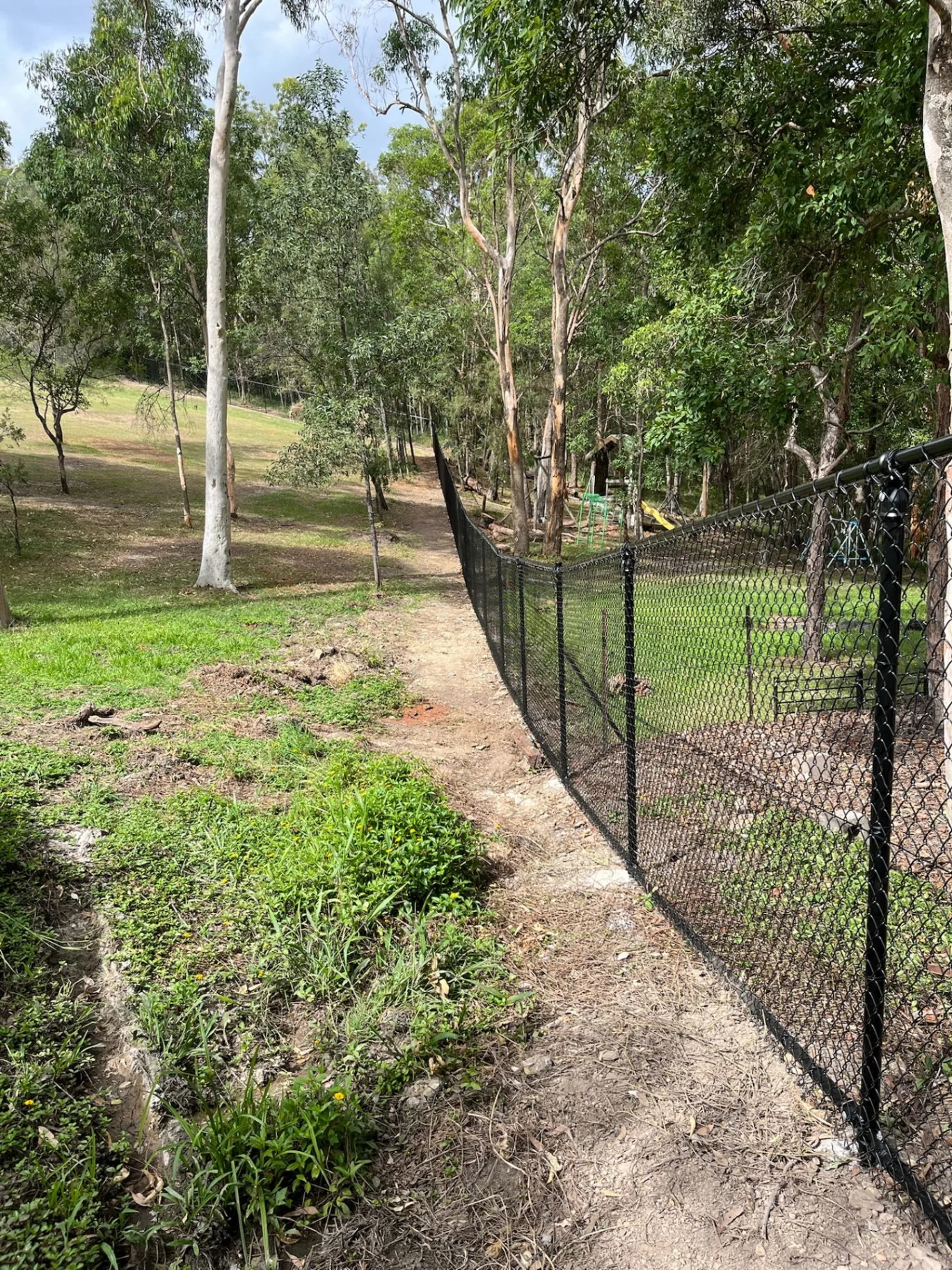 Rural chainwire boundary fencing on an acreage property